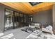 Inviting patio with comfortable seating, stylish rug, and a warm wooden ceiling perfect for relaxation at 1100 S Elizabeth St, Denver, CO 80210