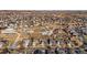 Wide aerial shot of the neighborhood, showcasing a sprawling suburban community at 5211 E 116Th Ave, Thornton, CO 80233