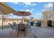 Spacious deck with outdoor seating and umbrellas perfect for entertaining in the backyard at 5211 E 116Th Ave, Thornton, CO 80233