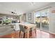 Bright living room, dining area with sliding door to patio at 5211 E 116Th Ave, Thornton, CO 80233