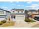 Charming two-story home with a well-maintained yard, two-car garage, and inviting front porch at 3344 Evening Pl, Castle Rock, CO 80109