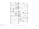 Detailed floor plan showcasing the layout of the first floor, including the kitchen, living room, and bedrooms at 1844 S Jay Way, Lakewood, CO 80232