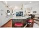 Open kitchen with large island, granite countertops, and seating for casual dining at 1844 S Jay Way, Lakewood, CO 80232