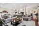 Expansive living area seamlessly integrates the kitchen and dining spaces at 1844 S Jay Way, Lakewood, CO 80232