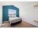 Bedroom with carpeted floors, a large window, a bed and closet with built-in shelves at 8778 S Kipling Way # 304, Littleton, CO 80127