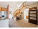 Dining area with access to kitchen and stairs at 8778 S Kipling Way # 304, Littleton, CO 80127