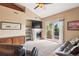 Cozy living room with fireplace, adjacent to the balcony with outdoor view at 8778 S Kipling Way # 304, Littleton, CO 80127