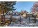 Community pool and surrounding area with winter landscaping at 4084 S Carson St # A, Aurora, CO 80014