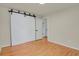 Bedroom with a closet, and hardwood floors at 8304 Eaton Way, Arvada, CO 80003