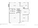 First floor layout featuring a garage, living room, and kitchen at 9241 Roadrunner St, Highlands Ranch, CO 80129