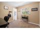 Functional office space with neutral tones, natural light, and practical furnishings at 6868 S Birch Way, Centennial, CO 80122