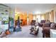 Spacious living room featuring plush seating, and an open floor plan to the dining area at 2015 Arapahoe St, Golden, CO 80401