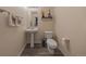 Clean bathroom with pedestal sink and toilet at 6005 Turnstone Pl, Castle Rock, CO 80104