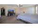 Spacious bedroom with large TV and walk-in closet at 6005 Turnstone Pl, Castle Rock, CO 80104