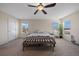 Primary bedroom with ceiling fan and ample natural light at 6005 Turnstone Pl, Castle Rock, CO 80104