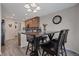 Dining area with four chairs and a view into the kitchen at 6005 Turnstone Pl, Castle Rock, CO 80104