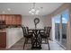 Kitchen dining area with a table for four and access to a patio at 6005 Turnstone Pl, Castle Rock, CO 80104