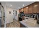 Modern kitchen with stainless steel appliances and light wood cabinets at 6005 Turnstone Pl, Castle Rock, CO 80104