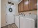 Spacious laundry room with washer, dryer and extra storage at 6005 Turnstone Pl, Castle Rock, CO 80104