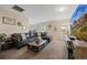 Living room with a comfortable sectional sofa and a wooden coffee table at 6005 Turnstone Pl, Castle Rock, CO 80104