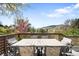 Enjoy outdoor dining with this spacious deck featuring stunning views and comfortable seating at 600 Cascade Dr, Golden, CO 80403