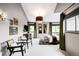 Bright main bedroom with vaulted ceilings, windows with green views, comfortable seating and carpet flooring at 600 Cascade Dr, Golden, CO 80403