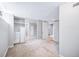 Basement bedroom with neutral carpet and a closet with mirrored doors at 2731 S Logan St, Englewood, CO 80113