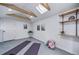 Bright, sunny flex space featuring skylight, exposed beams, and backyard access at 2731 S Logan St, Englewood, CO 80113