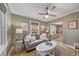 Stylish living room with a cozy couch, hardwood floors, and modern lighting at 2731 S Logan St, Englewood, CO 80113