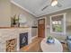 Cozy living room with fireplace, hardwood floors, and a stylish interior design at 2731 S Logan St, Englewood, CO 80113