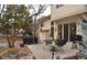 Cozy patio with hot tub, table, and outdoor seating, perfect for relaxing at 9946 Wyecliff Dr, Highlands Ranch, CO 80126