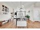Spacious dining area with a modern table, bench seating, and contemporary decor at 1575 W 68Th Ave, Denver, CO 80221
