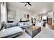 Open-concept living room and kitchen with modern decor at 1575 W 68Th Ave, Denver, CO 80221