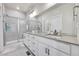 Modern main bathroom featuring a double vanity, and glass shower at 1575 W 68Th Ave, Denver, CO 80221