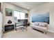 Home office with comfortable seating, modern desk, and a large window for plenty of natural light at 1575 W 68Th Ave, Denver, CO 80221