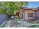 Relaxing backyard featuring a patio, grill, mature tree, and outdoor space for entertainment at 1866 S Pennsylvania St, Denver, CO 80210