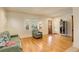 Bright living area with hardwood floors, large windows, and comfortable seating for relaxing or entertaining at 1866 S Pennsylvania St, Denver, CO 80210