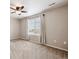 Bedroom featuring a ceiling fan, neutral walls, plush carpeting, and a window providing natural light at 25466 E 4Th Pl, Aurora, CO 80018