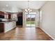 The dining area opens to the kitchen and features a glass sliding door, providing great natural light and backyard access at 25466 E 4Th Pl, Aurora, CO 80018