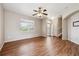 Bright living area with hardwood floors, a ceiling fan, and natural light at 25466 E 4Th Pl, Aurora, CO 80018