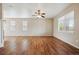 Spacious living room with hardwood floors and large windows at 25466 E 4Th Pl, Aurora, CO 80018