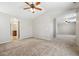 Spacious main bedroom with ensuite bathroom and neutral tones at 25466 E 4Th Pl, Aurora, CO 80018