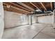 Large unfinished basement with exposed ceiling and insulated walls, ready for customization at 25466 E 4Th Pl, Aurora, CO 80018