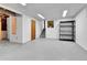 Unfinished basement featuring a metal storage shelf and stairway to the floor above at 13134 Deneb Dr, Lone Tree, CO 80124