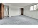 Bedroom with natural light from windows, soft carpeting, and closet at 13134 Deneb Dr, Lone Tree, CO 80124
