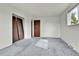Bedroom with soft carpeting, natural light from windows, and closet at 13134 Deneb Dr, Lone Tree, CO 80124