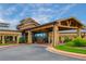 Stunning view of the clubhouse entrance featuring stone columns and timber beams at 7750 S Buchanan Way, Aurora, CO 80016