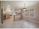 Spacious kitchen with ample counter space, cabinetry and stainless steel appliances at 7750 S Buchanan Way, Aurora, CO 80016