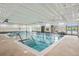 Indoor swimming pool with lap lanes, perfect for exercise or relaxation at 7750 S Buchanan Way, Aurora, CO 80016