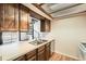 Well-maintained kitchen featuring a bright overhead light fixture with lots of counter space at 10890 W Evans Ave # 3D, Lakewood, CO 80227